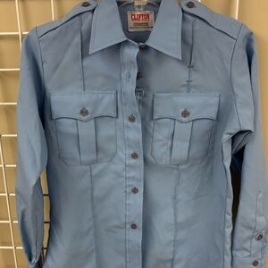 Clifton Uniform Company Police shirt size 36R. According to size chart..MORE